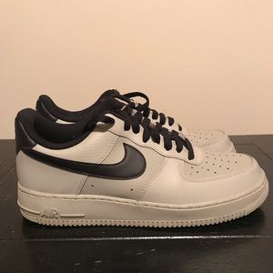 Grey and black Nike Air Force ones